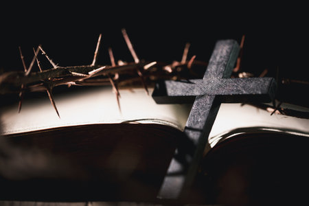 Crucifixion of Jesus Christ, nail-pierced hands, crown of thorns, cross, symbol of Christianity, representing holy sacrifice, passion, faith central to Easter celebration, religious tradition.の写真素材