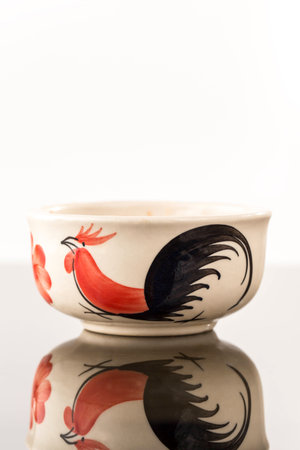 porcelain bowls isolated painted chickenの写真素材