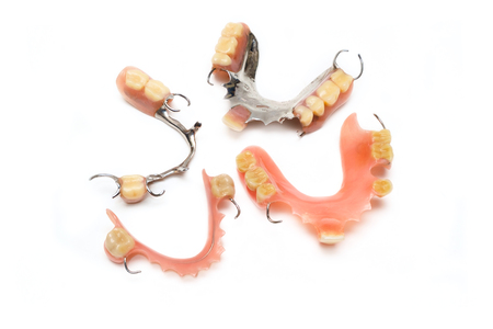 old man real denture with plastic type and stainless steal type.