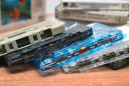 old tape cassettes on the wood table, good old day memories.