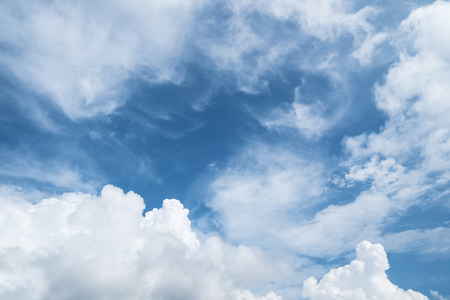 different shape of clouds in the blue sky.の写真素材