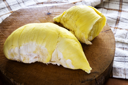 durian king of all fruits very fresh and yummy durian plate on the wood table.の写真素材