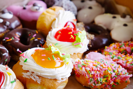 Various Donut, Chocolate frosted, Fruit jams and more.の写真素材