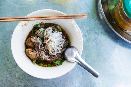Pork Noodle Soup on the table, Asian style gourmet fresh and tasty food.の写真素材