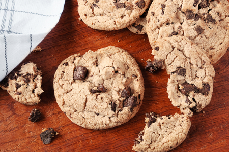 Homemade Chocolate chip cookies on wood plate.の写真素材