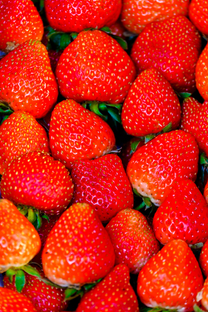 Raw and Fresh Red Strawberries background, Healthy and High Vitamin Fruit Background.の写真素材