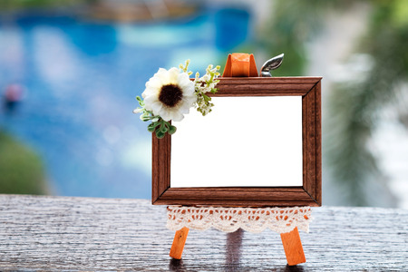 Small Cute Wood Picture Frame Outdoor by Side of the Swimming Pool.の写真素材