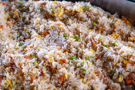 Rice Mixed with Shrimp Paste in a Big Stainless Bowl, Prepared for Outdoor Party.の写真素材