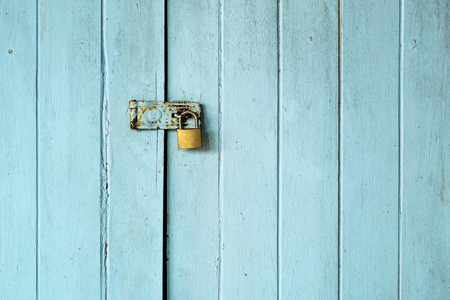 Old Padlock on the Vintage Retro Wood Door.の写真素材