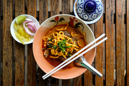Thailand Northern Style Curried Noodle Soup with Beef. Khao Soi Beef, Famous and Yummy Local Style Noodle.の写真素材