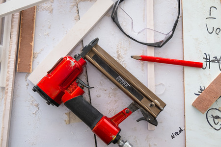 Nail Gun in the Furniture industrial Shop for Furniture Builds, Carpentry Tools.