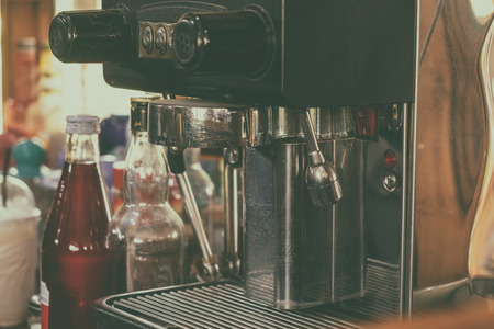 Small Professional Coffee Machine After Use in the Resturant. Vintage Retro Style Picture Added.の写真素材