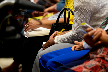 Old Women Listen to the Sermon and Writting Something on the Paper.