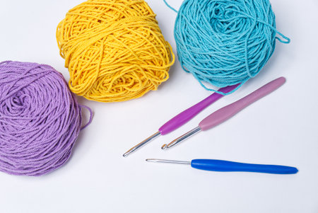 Blue Handmade Knitting Bag on Wood Table with Yarn Ball and Knitting Needles.の写真素材