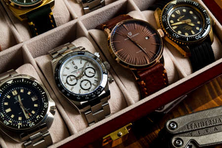 2021-06-02 Various Collection of Homage Wrist Watches in the Watches Box on the Wood Table in Bangkok, Thailand.のeditorial素材