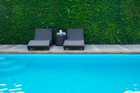 Pool Bed Beside Swimming Pool for Relaxation in the Holiday and Vacation.