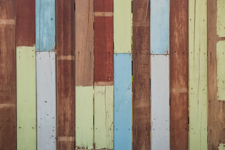 Weathered and Various colours Wooden Wall in the Outdoor Garden.の写真素材