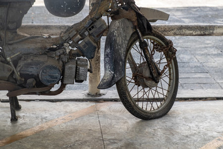 The Remains of an Old, Non-Functional Motorcycle Parked in a Motorcycle Graveyard, Awaiting...