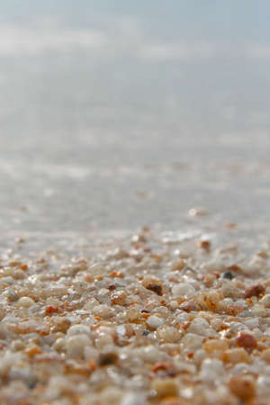Close up of stones and marble. Smooth and polished. Pebble on shingle beach. Colorful small pebble...