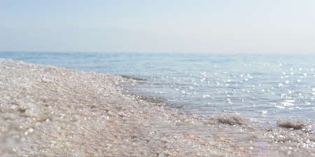 Sea waves on a sandy beach. Sea waves on the shore of the sea.の写真素材