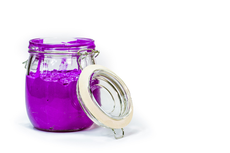 purple color of plastisol ink in white background fill in transparent bottle.plastisol ink is specially for print on tee shirts and any fabricの写真素材