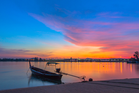 scenery sunrise above Sarasin bridge. fishing boats parking on the Sarasin beach. Sarasin bridge linking the province of Phang Nga and Phuket.の写真素材