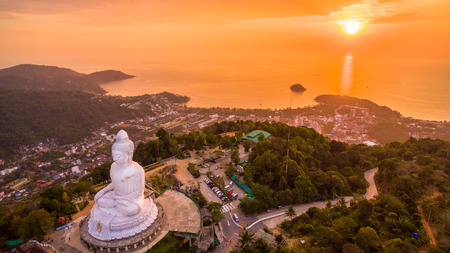aerial view sweet sunset at Phuket big Buddha. Phuket Big Buddha statue is one of the island most important and revered landmarks on the island.の写真素材