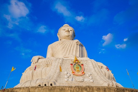 Phuket big Buddha in blue sky. locate of Phuket big Buddha viewpoint on the high mountain can see around Phuket islandstuning sunrise in Chalong gulfの写真素材