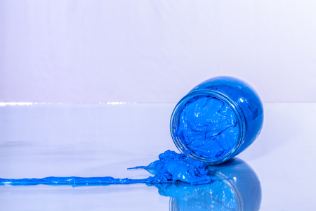 blue color of plastisol ink on white background. plastisol ink use for screen print on tee shirt and any fabricの写真素材