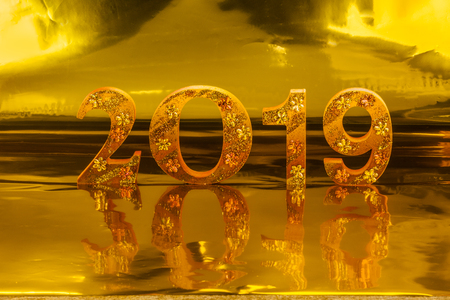 2019 is made in gold color place in golden background is mean the golden year for lucky all yearの写真素材