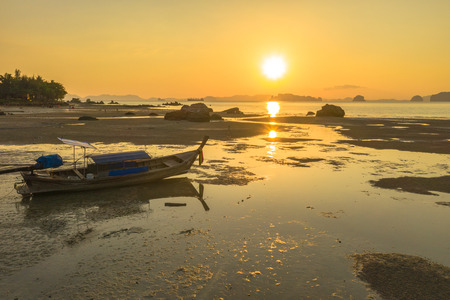 Tup Kaek beach close to Kwang beach and non Nak mountain during low tide 
can see long and large beach can walk around many big rocks on the beach 
beautiful sunset behind archipelago in Andaman seaの写真素材