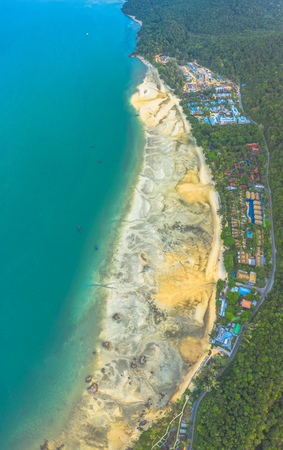 Tup Kaek beach close to Kwang beach and Ngon Nak mountain during low tide can see long and large beach can walk around many big rocks on the beach beautiful sunset behind archipelago in Andaman seaの写真素材
