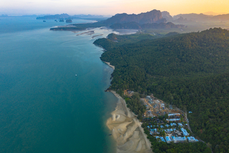 Tup Kaek beach close to Kwang beach and Ngon Nak mountain during low tide can see long and large beach can walk around many big rocks on the beach beautiful sunset behind archipelago in Andaman seaの写真素材