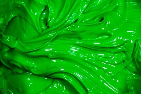 close up ufo green color of oil paint. ink of screen printing  for print on tee shirts and fabricの写真素材