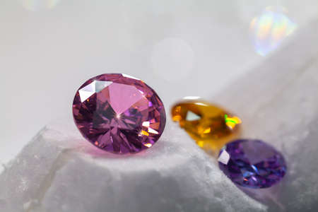 amethyst diamonds sparkle on a white background.