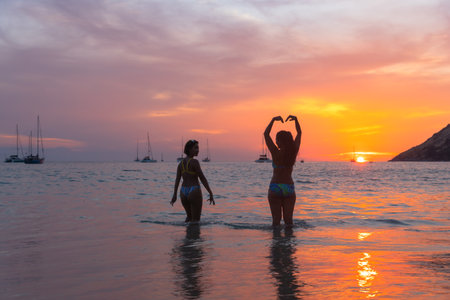 During the outbreak not many tourists on Nai Harn beach. but still have local people on the Nai Harn beach Phuket Thailand.の写真素材