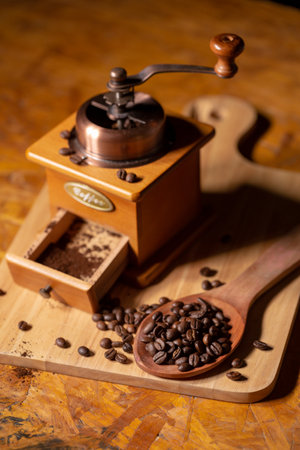 A convenient hand-cranked black coffee grinder that can brew coffee for yourself.の写真素材