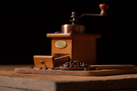 A convenient hand-cranked black coffee grinder that can brew coffee for yourself.の写真素材