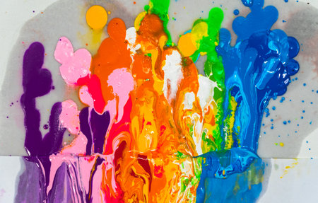 abstract color splash isolated on white background. Creating works by real hands, not added with...