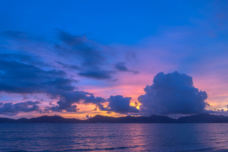 Scene of landscape views cloud moving above mountain range in summer day,
nature rain cloud of nature cloudscape sky At Phuket big Buddha on the high mountain, Phuket,Thailand.の写真素材
