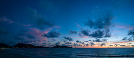 Drones take pictures of the beautiful sky by the beach in stunning sunset.
colorful sky in sunset above Patong city at twilight. 
Scene of romantic sky sunset background.の写真素材