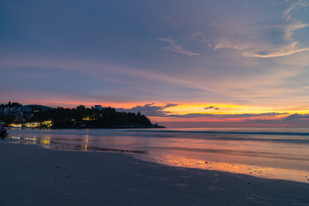 scene romantic sunset at Karon beach. abstract nature background.Sunset with bright color light rays and other atmospheric effects.Gradient color.cloudscape background.の写真素材