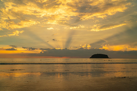 Amazing beautiful golden sunset above the ocean.
cloud moving in nature cloudscape sky of sunset over the sea.
Scene of Colorful romantic sky sunset with gold color of the sky background.の写真素材