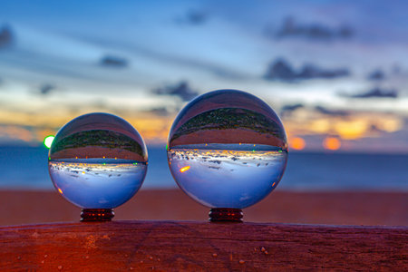 footage of the sea when the sun falls into crystal balls. Imagine a fantasy colorful clouds...