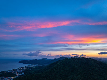aerial night view beautiful lighting around the Phuket big Buddha.  
Twinkling lights along the beach and in various towns around Phuket Island. 
creative nature and travel concept.lighting background.の写真素材