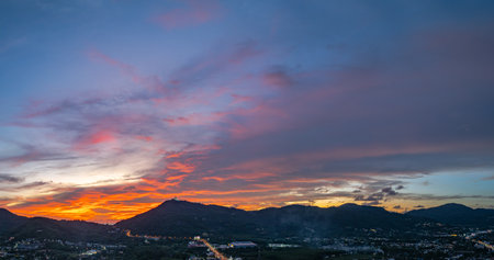 Phuket Big Buddha with a dramatic sunset in the background Spectacular sunset over Phuket Big Buddha from an aerial perspective Dramatic Sunset Over Phuket Hills.
the silhouette of the hillsの写真素材