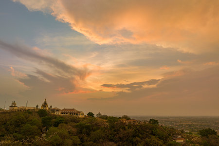 aerial view beautiful golden sunrise the palace in Phetchaburi city on hilltop.A beautiful palace built on top of a hill is a famous landmark on the hilltop of Phetchaburi province.の写真素材
