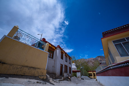 Guardians of the Past Likir Monastery and the Golden Maitreya.Standing tall amidst Ladakhâs stark beauty, the magnificent Maitreya Buddha statue at Likir Monastery radiates peace and promise.の写真素材