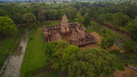 An aerial view of Sadok kok thom Stone Castle an ancient Khmer-style temple.This exudes cultural richness and timeless beauty, ideal for themes of heritage, travel, and Southeast Asian architectureの写真素材