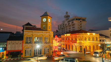 Phuket,Thailand-February 10,2025: colorful sky above The classic building in Phuket. Scene of romantic beautiful sky sunset with cloud in the sky background. The clock tower is a landmark of Phuket.の写真素材